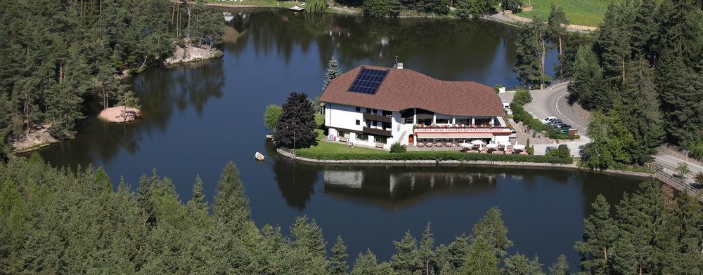 Hotel Am Wolfgrubenersee Soprabolzano Exterior photo